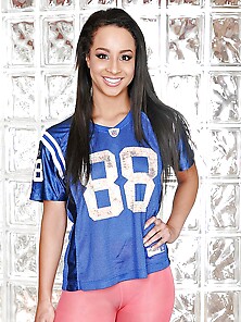 Female Football Fan Takes Off Top And Pink Leggings By The Glass