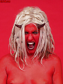 Blonde Painted Red Wearing Horns Of The Devil