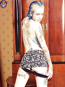 Sexy Tattoo Punk Girl Strips Off Skull Gear