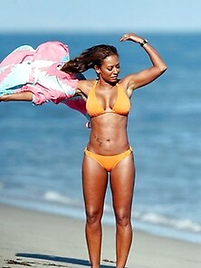 Melanie Brown's Sexy Booty In Orange Bikini