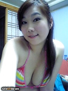 Toshu Takes Thousands Of Pics Of Her Tits In All Her Bikinis