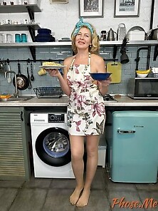 Mature Diana Serving Lunch In Pantyhose And Apron