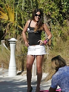 Claudia Romani Posing In Her Mini Skirt