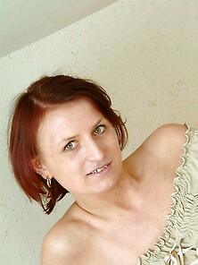 Mature Brunette Sheds White